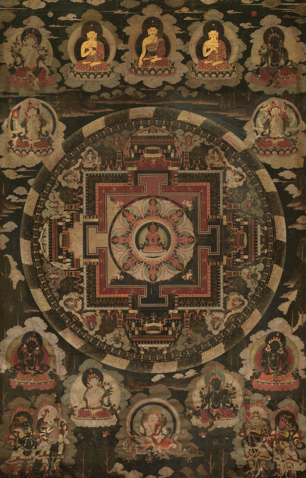 Pintura tibetana de un mandala, rodeado de budas, bodhisattvas y guardianes